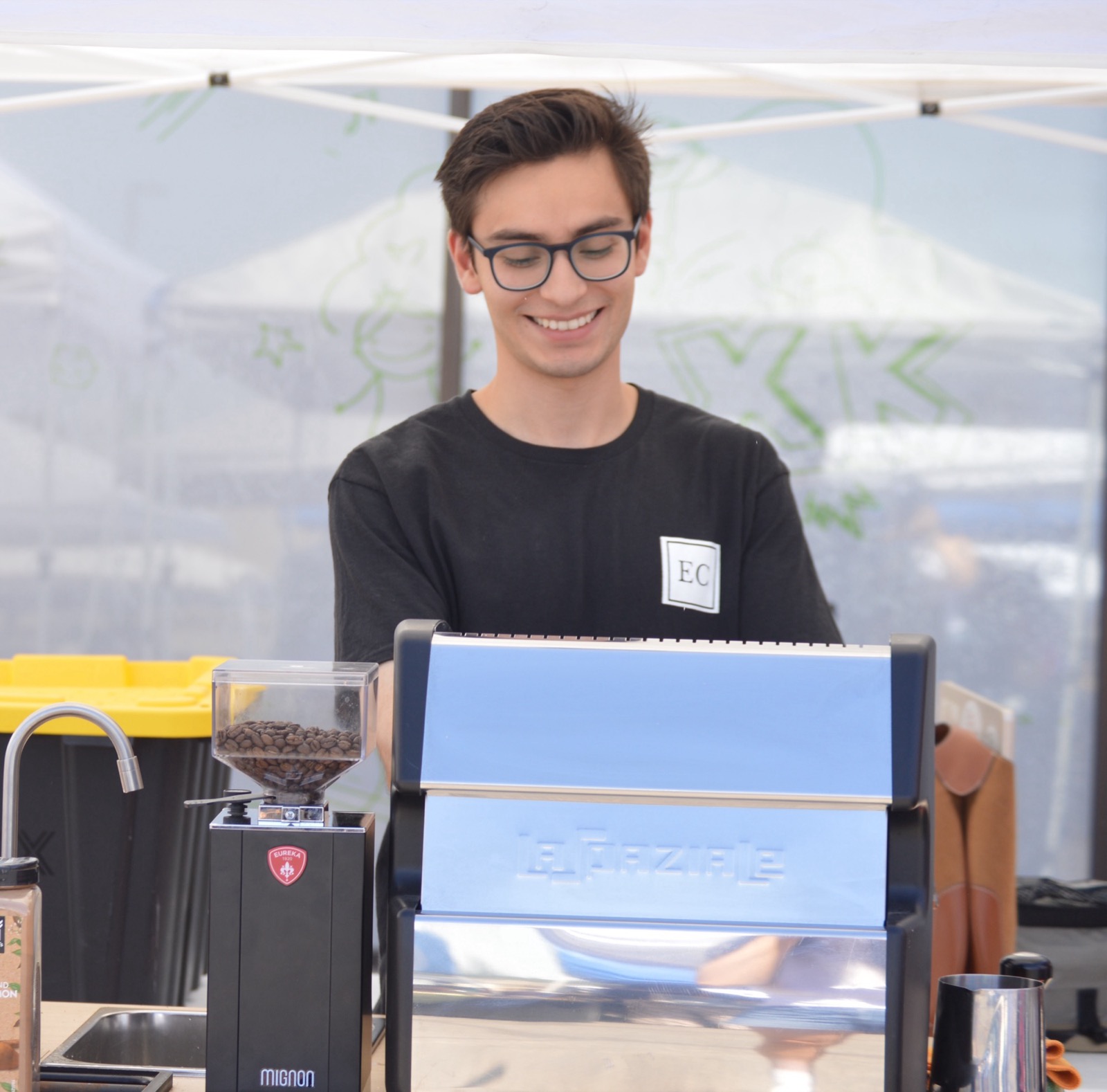 Esencia Coffee barista at a market event